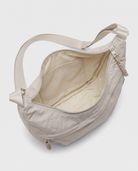 all-groups - The Agathe Crossbody, open, showing the lined interior