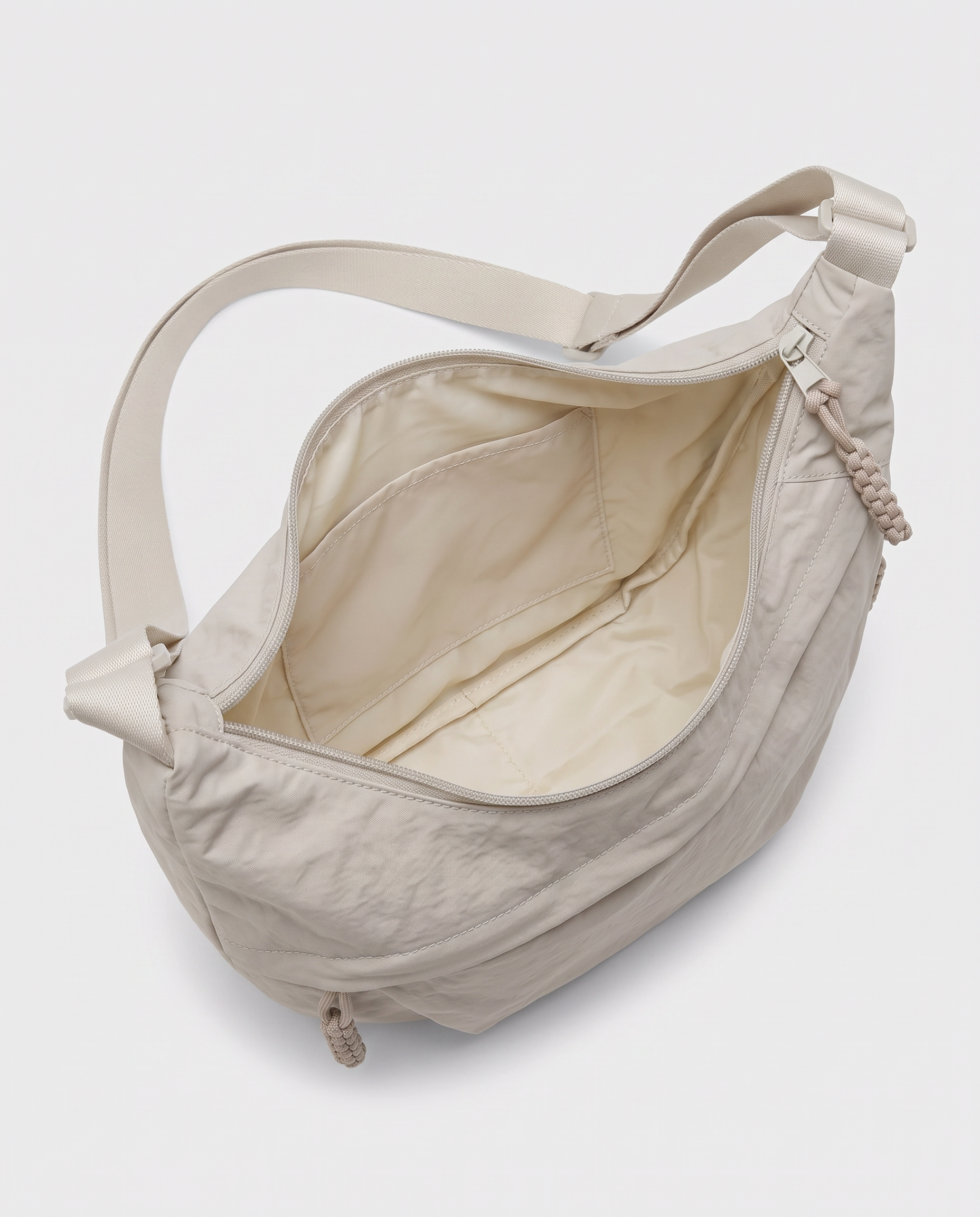 all-groups - The Agathe Crossbody, open, showing the lined interior