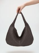 all-groups - The Marceline Hobo, held by the handle, showing its soft slouchy body