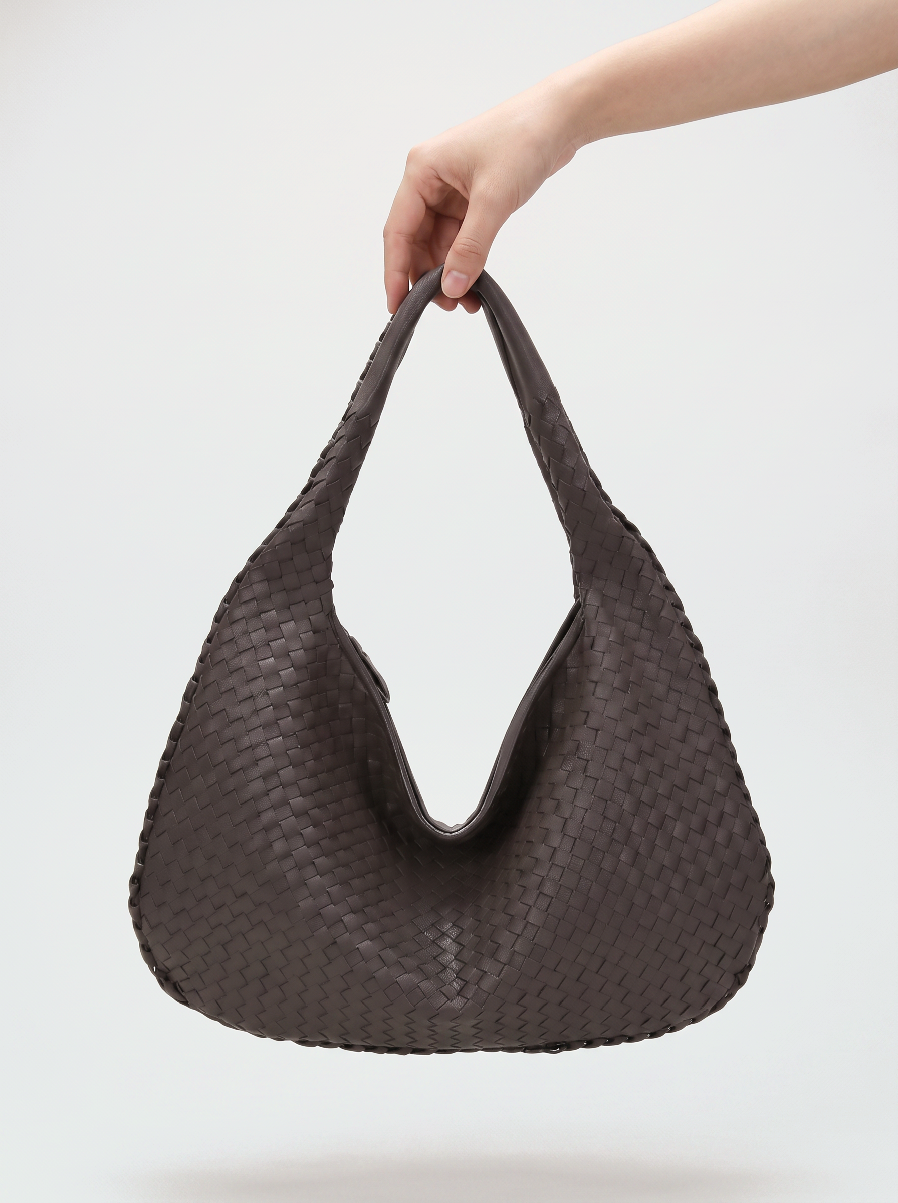 all-groups - The Marceline Hobo, held by the handle, showing its soft slouchy body