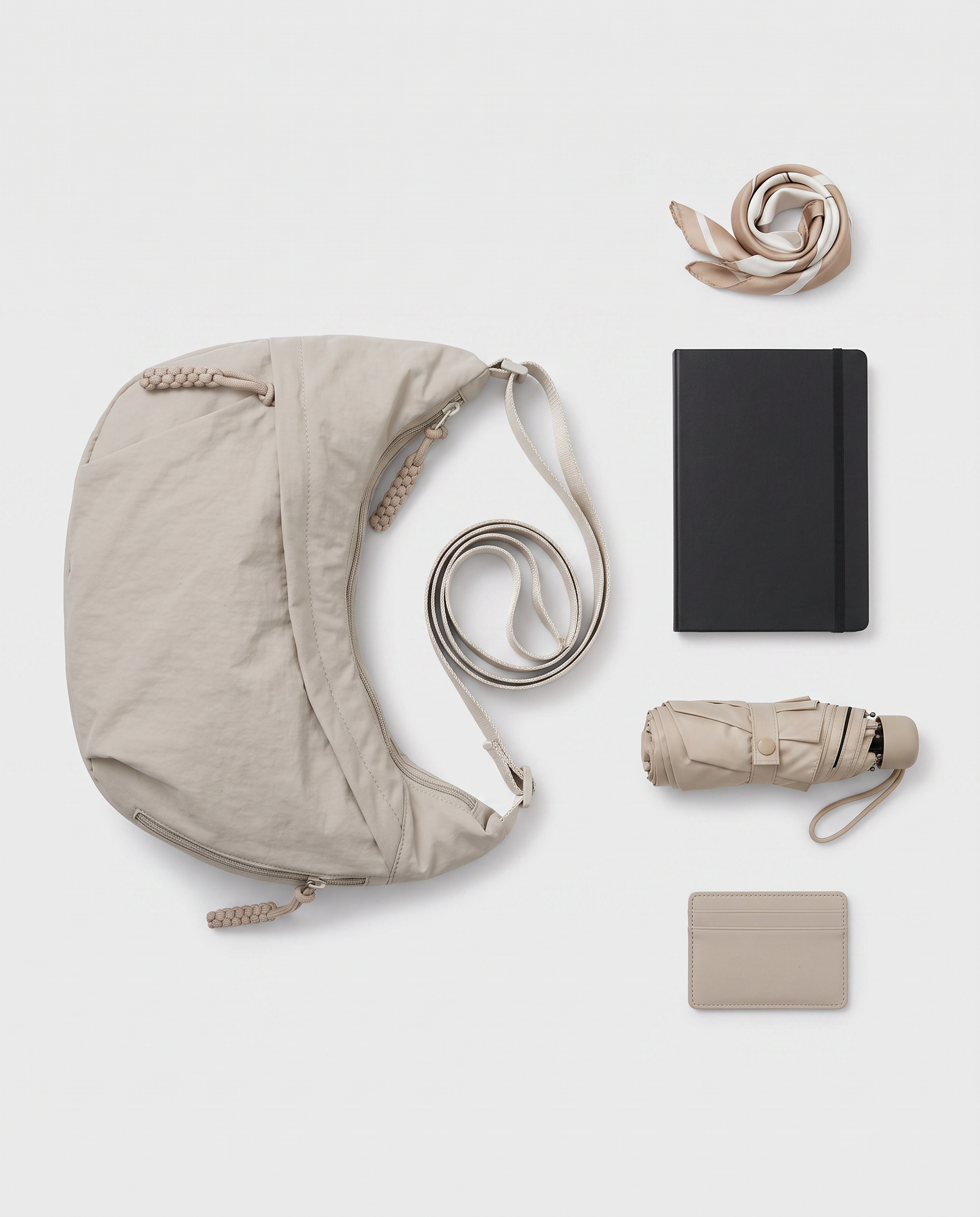 all-groups - The Agathe Crossbody, size and capacity next to everyday essentials