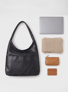all-groups - The Honorine Hobo, size and capacity next to everyday essentials
