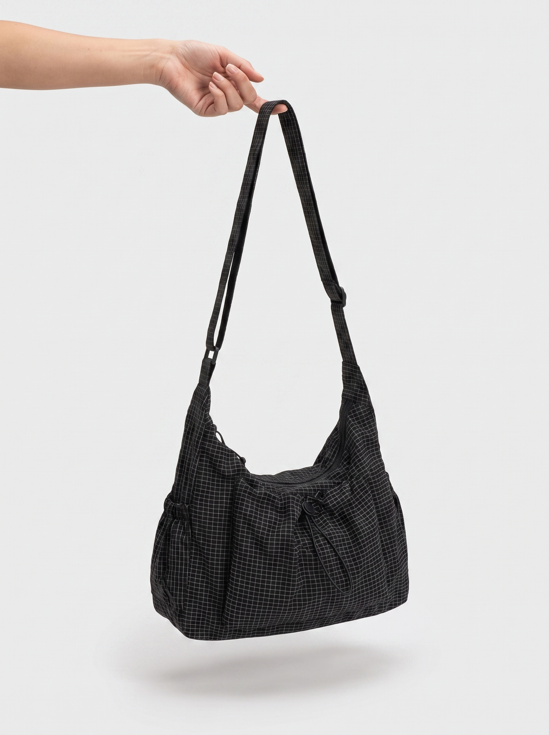 all-groups - The Lucienne Crossbody, lightweight design, held with one hand